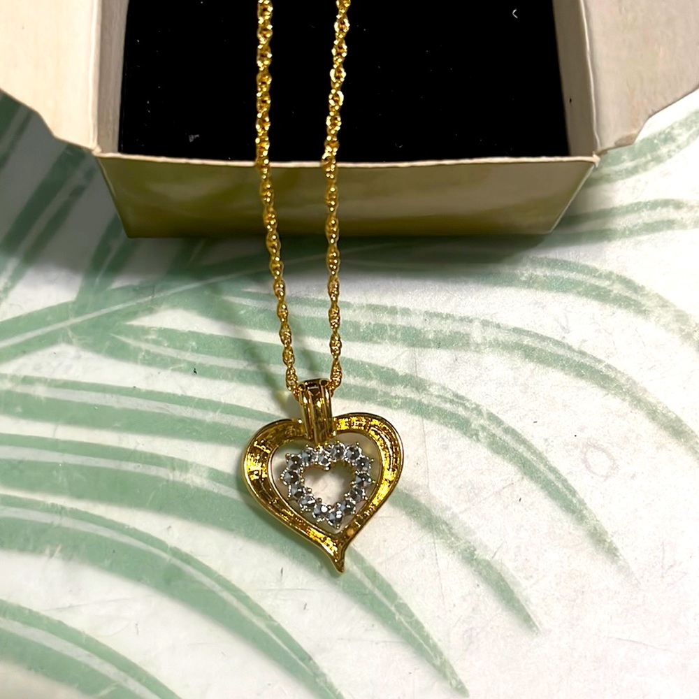 Five way reversible heart pendant